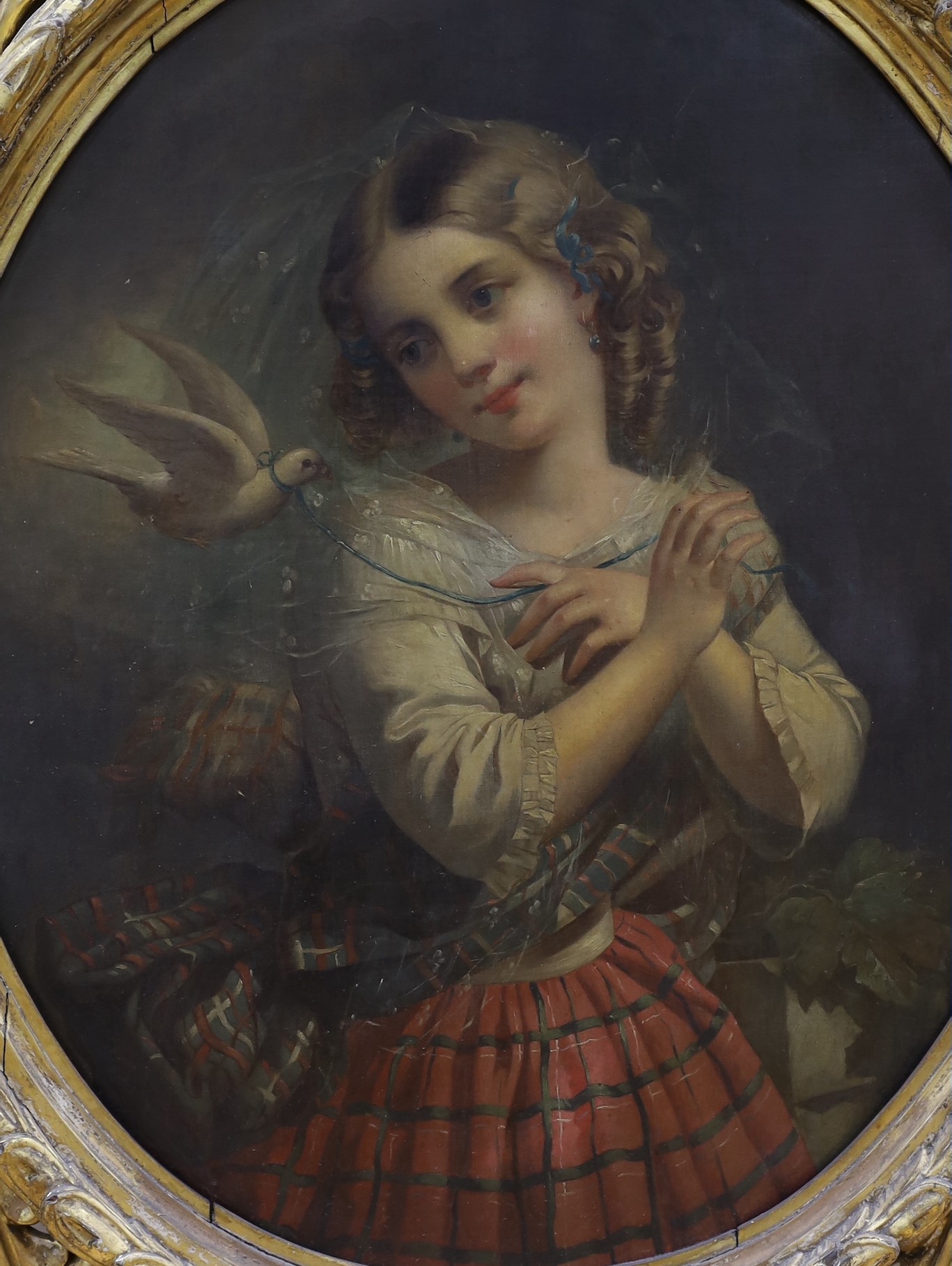 Edwin Landseer (British, 1802-1873) Scottish youth holding a hawk and girl with a dove, pair of oleographs she signed in the plate and dated 1856, ovals, 71 x 58cm. Ornate gilt wood frames